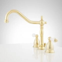 Signature Hardware Victorian 1.2 GPM Widespread Bathroom Faucet with Large Porcelain Cross Handles and Pop-Up Drain Assembly 10 Signature Hardware Victorian 1.2 GPM Widespread Bathroom Faucet with Large Porcelain Cross Handles and Pop-Up Drain Assembly -Central Brass store signature hardware 900907 side view 89