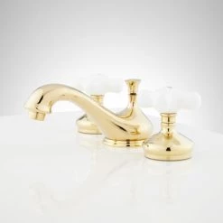 Signature Hardware Teapot 1.2 GPM Widespread Bathroom Faucet with Porcelain Cross Handles and Pop-up Drain Assembly -Central Brass store signature hardware 904218 side view 32