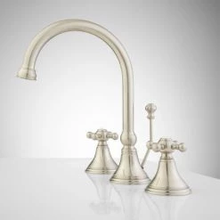 Signature Hardware Melanie 1.2 GPM Widespread Bathroom Faucet with Small Metal Cross Handles and Pop-up Drain Assembly 8 Signature Hardware Melanie 1.2 GPM Widespread Bathroom Faucet with Small Metal Cross Handles and Pop-up Drain Assembly -Central Brass store signature hardware 910139 side view 50