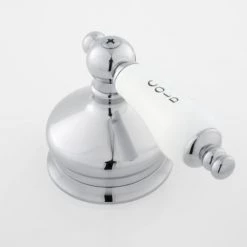 Signature Hardware Shannon Widespread Bathroom Faucet with Porcelain Lever Handles and Pop-Up Drain Assembly -Central Brass store signature hardware 918816 handle close up view 372