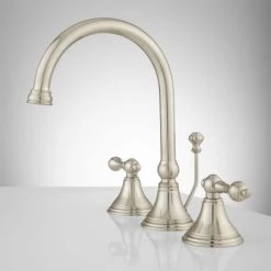 Signature Hardware Melanie 1.2 GPM Widespread Bathroom Faucet with Small Metal Lever Handles and Pop-up Drain Assembly 6 Signature Hardware Melanie 1.2 GPM Widespread Bathroom Faucet with Small Metal Lever Handles and Pop-up Drain Assembly -Central Brass store signature hardware 918898 side view 96