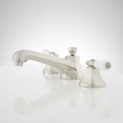 Signature Hardware New York 1.2 GPM Widespread Bathroom Faucet with Porcelain Lever Handles and Pop-up Drain Assembly 8 Signature Hardware New York 1.2 GPM Widespread Bathroom Faucet with Porcelain Lever Handles and Pop-up Drain Assembly -Central Brass store signature hardware 918901 side view 108